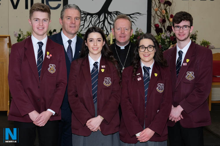 Archbishop Eamon Martin with Principal Mr Jarlath Burns and current Head Boys and Head Girls at St Paul’s High School, Bessbrook: From left: Richard Keenan, Kerrie Fegan, Tara Clarke and Jack McKevitt . Photograph: Columba O'Hare
