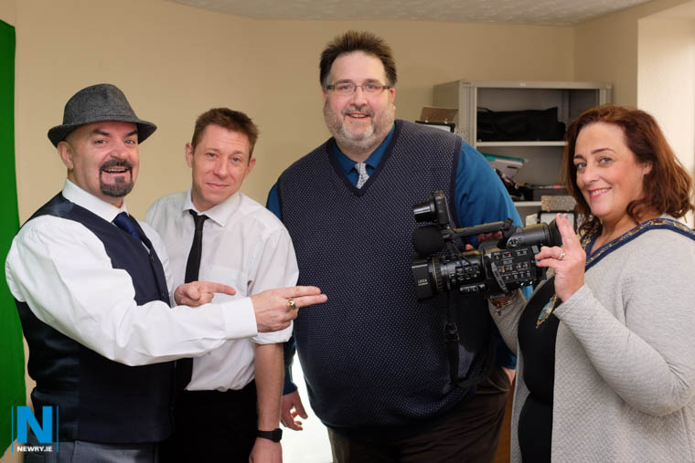 Cllr Gillian Fitzpatrick, Chairperson, Newry, Mourne and Down Council tries her hand at filming at the launch of Sugar Island Media. From left are Tony (Riser) Smith, Micky Dodds and Keven Sands. Photograph: Columba O'Hare