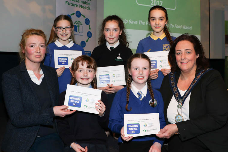 Environmental Youth Speak 2017 Photo 1 Five spot prizes of £15 Amazon vouchers were presented to the lucky winners by Chairperson Newry, Mourne and Down Council, Councillor Gillian Fitzpatrick and Celine Rice representing Sponsors Natural World Products. Back row l-r Ellie Magee St Nicholas’s PS Ardglass, Aileen Kearney Ballyholland PS, Sarah Brennan St Joseph’s PS Crossgar, front row l-r Celine Rice, Poppy McCormick Kingsmill PS, Erin Doyle Christ The King PS  Ballynahinch and Chairperson Councillor Gillian Fitzpatrick.