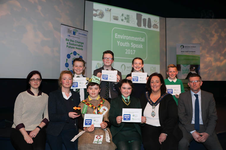 The 2017 Environmental Youth Speak was held in St Patrick's Centre, Downpatrick and the standard of speakers was outstanding. The Judges had a difficult task and are pictured with the prizewinners in both the Junior and Senior Section. back row left to right Senior Section 3rd Niall Rice, St Malachy's High School Castlewellan, Senior Section 2nd Ruairdhri Linden, St Louis Grammar School Kilkeel, Junior Section 2nd Eadaoin Trainer Cloghogue Primary School Newry, Junior Section 3rd Cormac O'Hare Our Lady and St Patrick's Primary School Downpatrick, front row l-r Cathy Gorman Eco Schools NI (Judge), Celine Rice Natural World Products, (Sponsor and judge), Winner Junior Section Matthew Magee St Malachy's Primary School Camlough, Winner Senior Section Mia Comer Sacred Heart Grammar School Newry accepting their prizes from  Chairperson Newry, Mourne and Down District Council, Councillor Gillian Fitzpatrick, Judge Eoin Devlin Assistant Director Health and Wellbeing NMDDC.
