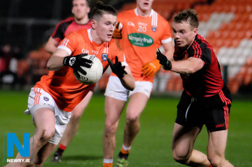 Armagh's Joe McElroy under pressure from Downs Brendan McArdle at the Dr McKenna Cup clash between Armagh and Down at the Athletic Grounds. Photograph: Columba O'Hare