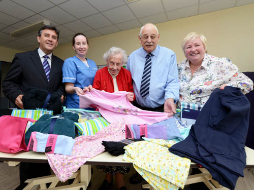 Sandra Burns, Lead Nurse for Medicine, Ursula Haughey, Clinical Sister, Stroke Rehab Ward, Dorothy Sharpe, Lead Nurse for Surgery, and Ronan Carroll, Southern Trust Assistant Director for Acute Services with some of the wash bags kindly donated by the Lions Club for those patients most in need at Daisy Hill Hospital.