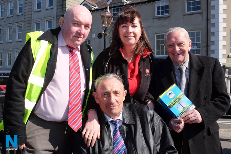Michael O'Hare and James McArevey, Newry Maritime Association with Christine Burns, J.R. Lighting and Michael McCaul snr who unveiled the restored gaslight in Newry. Photograph: Columba O'Hare, 