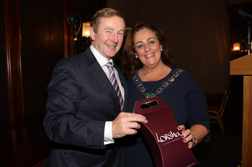 Chairperson Newry, Mourne and Down District Council Gillian Fitzpatrick presents Taoiseach Enda Kenny with a Lorsha Silk Tie to mark his visit to Newry Junior Chamber Bordering on Brexit Lunch in the Canal Court Hotel.