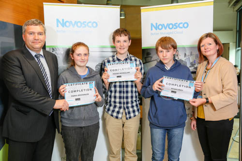 Students from Newry Fiona Brownlee, Our Lady’s Grammar; Frank McMullan, St Colman’s College; and Ryan Gray, Abbey Grammar receive their certificates for successfully completing the prestigious Novosco Cloud Camp in association with Almac from Susan Hill, Novosco and Dr Jonathan Heggarty, Director of Curriculum, Belfast Met. Photograph; Philip Magowan