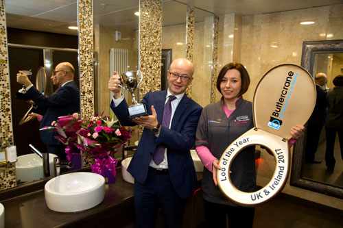Peter Murray Buttercrane Shopping Centre Manager with Ola Bielska, Cleaning Supervisor, Robinsons Services and their Loo of the Year Award.