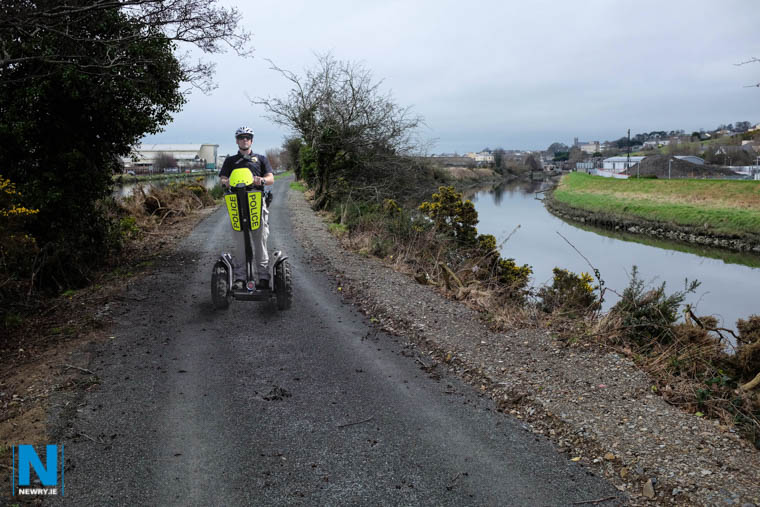 A member of the elite European Union border police checks out the new greenway, close to the Albert Basin in Newry yesterday afternoon. Photograph: Columba O'Hare