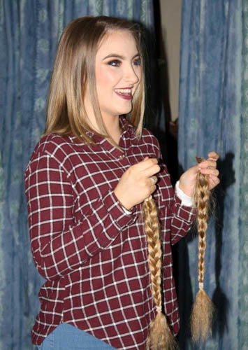  Shauneen following her hair cut with her plaits to be donated to the Little Princess Trust