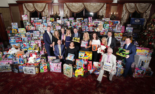 President of Newry Chamber of Commerce and Trade Michael McKeown is pictured with the organising committee of the Newry Chamber Christmas Charity Dinner at the ‘Toy Mountain’ in the Canal Court Hotel during the Annual Dinner. The toys were generously donated by more than 700 patrons who attended the dinner and will be distributed to families in the greater Newry Area by St Vincent de Paul and the Salvation Army. The dinner in its 17th year raised just under £100,000 for local causes this year and brings the total raised by the annual dinner to £1.230million.
