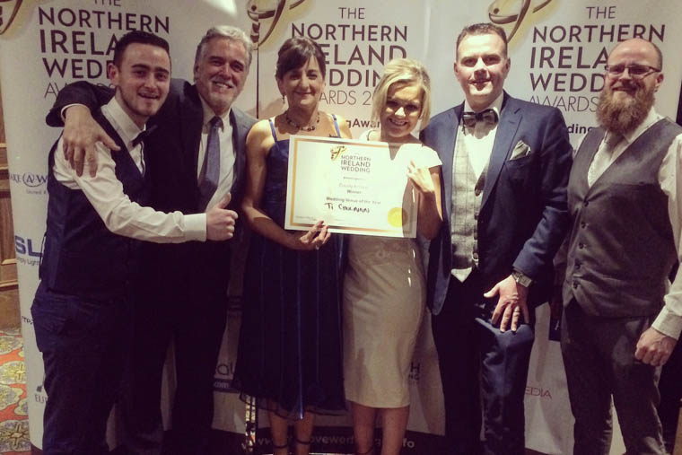 Tí Chulainn Staff Aaron O’Brien, Brendan Hodgers, Mary Toal, Danielle Doherty, Thomas Marron and Gary Bennett with their award.  