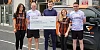 Sean Boyle from Evora Hospice, centre, receives a cheque from Playr-Fit staff, from left: Caitlin Ryan, Darren McPolin, Tara-Nicole Caldwell and Cormac McNeice. 