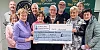 Members of Saval Lourdes Committee present a cheque to Geraldine Lambe from Evora Hospice.
