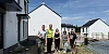 Justin McNulty MLA with local residents at the Parkhead development