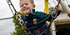 Reaching new heights and loving every bounce on the trampolines at the Three Ways Community Festival Funday!