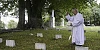Fr Oliver Stanfield blesses the graves at St Jude's Shrine, Omeath. Photograph: Columba O'Hare/ Newry.ie 