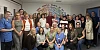 Philomena Fletcher and Patricia O'Gorman mark their retirement with colleagues and friends.