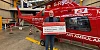 Stefan presents his cheque to Air Ambulance NI