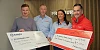 Freeburn Transport cheque presentation to Air Ambulance NI and Evora Hospice Care. Pictured from left: Sean Boyle, Evora Hospice, Chris Freeburn, Freeburn Transport, Paula McCourt, Freeburn Transport and Damien McAnespie, Air Ambulance NI