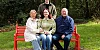 Caoimhe Loughran from Newry with her parents Leona and Collie and brother Eoin at the British Heart Foundation bench installed in living tribute to Caoimhe, who had a pacemaker fitted at just 20 years of age, due to an underlying heart condition. The iconic red bench is situated in Kilbroney Park in Rostrevor.