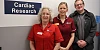 William Adams pictured with Michelle and Jane from the Cardiac Research Unit, where he took part in clinical trials supporting his recovery and now encourages others to consider taking part if offered.