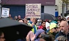 Justin McNulty MLA holds a banner aloft at the rally. Photograph: Columba O'Hare/ Newry.ie 