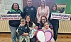 Whitecross woman Orlaith Moley, Health and Wellbeing Improvement Senior Officer at the Public Health Agency along with members; Aveen Connolly, Health Visitor; Joanne McSherry, Midwife; Senior Ladies Player and Midwife Anne-Marie McGrath, with daughter Lily; and Senior Men’s Player Gavin Henry, with wife Naomh and boys Ruadhán and Paudí.