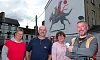Theresa Hince, Garry McElherron, Iúr Cinn Fleadh; Nina West and artist Kev Largey/ KVLR with the  new fleadh mural at Kilmorey Street in Newry, a tribute to the late artist John Farrelly. Photograph: Columba O'Hare/ Newry.ie 