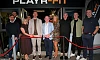The Playr-Fit team and guests cut the ribbon to celebrate their £2m investment 