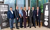 Partners in the Deposit Return Scheme. Included from left: Garth Lamb, Chief Development Officer, Re.Group; David Palmer-Jones OBE, Chief Executive Officer, CIRQLR; Joseph Doherty, Chief Executive Officer, Re-Gen; Jenny Powell, Chief Operating Officer, Exchange For Change; Russell Davies, Chief Executive Officer, Exchange For Change; John Scanlon, Executive Vice President UK, SUEZ and Rory Capper, Head of Sustainability and Innovation, Bywaters.