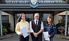 Sacred Heart Principal, Shane Comer, with Ellen Webster and Sinead O’Neill who got their GCSE results at Sacred Heart Grammar School.