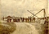 Photograph of a groups of workers at the Croreagh / Crowhill Granite Quarry c.1914. The company also had an architectural engineering and monumental works at Lower Catherine Street in Newry. Newry & Mourne Museum Collection