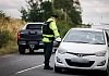 Police conduct a checkpoint on their 'All Out' day of action