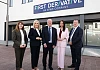 Economy Minister Dr Caoimhe Archibald, First Minister Michelle O’Neill, Andrew Colhoun, Head of First Derivative, deputy First Minister Emma Little-Pengelly and Kieran Donoghue, Chief Executive of Invest NI pictured at today's job announcement in Newry.