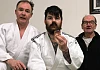 Shinken Shobu Ryu Judo Club member John McKinney with his bronze medal from the Inaugural Adaptive Judo Open competition. Also included are Dermot McCaul, left and Eddie Donnan, right.