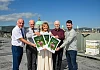 Pictured at the Housing Centre’s own beehives in Belfast are the Housing Executive’s (L/R) Robert McClean, Stephen Lowry, Jennifer Hawthorne, Ronnie McCreanor and Conor McCombe. 