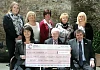 Adele Harris, Local Fundraising Manager for Northern Ireland accepts Cheque for £47,000 from Chairman Gervase McCartan & Treasurer Paddy O'Hanlon while looking on are back from left: Donna McConnell, Cora Trainor, Rosalind McCullough, Ray Dodds & Bernie Ward.