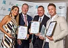 Celebrating Success at the Greater Newry Area Business Awards L to R Best Businesswoman Jackie Reid Deli-Lites, Paul Convery President Newry Chamber; Michael Blaney, MD Ashtree Financial Services winner of Outstanding Contribution Award and Conor Cole, Cole Groundwork Contracts, Best Young Entrepreneur.