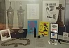 The 1970s display case in Gallery 3 at Newry and Mourne Museum contains artefacts reflecting the political, economic and cultural life of the Newry area during that period Newry and Mourne Museum Collection.
