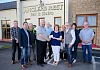 Howard Anderson, Chairman of Rathfriland Motorcycle Club presents a cheque to Sheila Carragher and friends of Newry & Mourne M.S. Community Therapy Centre Ltd while members of the club look on.