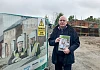 Cllr Michael Savage with a copy of the Housing Investment Plan detailing over 700 homes for Newry City.