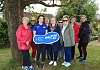 Arlene Johnston, Walking for All Officer NMDDC and Shirley Keenan, Crotlieve District Electoral Area Forum (centre) with some participants in the recent Walk for All event in Hilltown, which finished at Carcullion House for refreshments courtesy of Crotlieve DEA Forum.