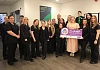 The Specsavers Newry team with Fiona McNaughton from Women’s Aid Armagh Down. 