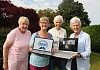 Margot Groves, Janice Bell, Caroline McCreight and Ada Elliott along with (on laptop) Debbie Marno, Judith Wainwright and Debbie Locklock launching the Mourne Marvels Virtual WI which any woman can join, as meetings will be held on Zoom