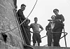 Visitors to the Haulbowline lighthouse photographed with the keepers c.1952. Patrick Keane (on first right), was keeper when the lighthouse became fully automated in 1965. Newry and Mourne Museum Collection