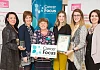 Pictured with their award for winning the Cancer Focus NI Big Shop Showdown were from left: Sarah Tumilty (HBE); Alana McGovern (HBE); Roisin Foster, Chief Executive, Cancer Focus NI; Alannah Brennan (HBE); Ruth Martin (HBE) and Melissa Faulkner, Banbridge Cancer Focus Store Branch Manager.