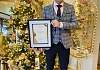 Jason Foody, General Manager of Killeavy Castle Estate with their award.
