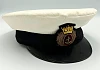 Cap worn by Captain John McParland. John McParland was born into a Newry seafaring family He became a Deck Boy on the SS Bamboo in April 1951 and continued a successful career in the merchant navy until his retirement in 1982. His last command was the MV Esso Tenby. Newry and Mourne Museum Collection