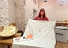 “Mrs. Agnew”, one of the Museum’s living history characters, with the pillowcase and bed sheet donated to the Museum by Rose McKevitt.