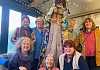 Members of Interwoven with their creation. 