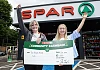 The Road Ahead NI: Monica Heaney from The Road Ahead NI is pictured with Bethany Priestley from SPAR NI, receiving £1,000 as part of the 2026 SPAR Community Cashback Grant.  